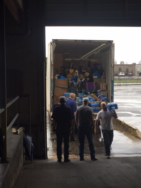 UNITS team loading trucks with Concordia team for hurricane relief